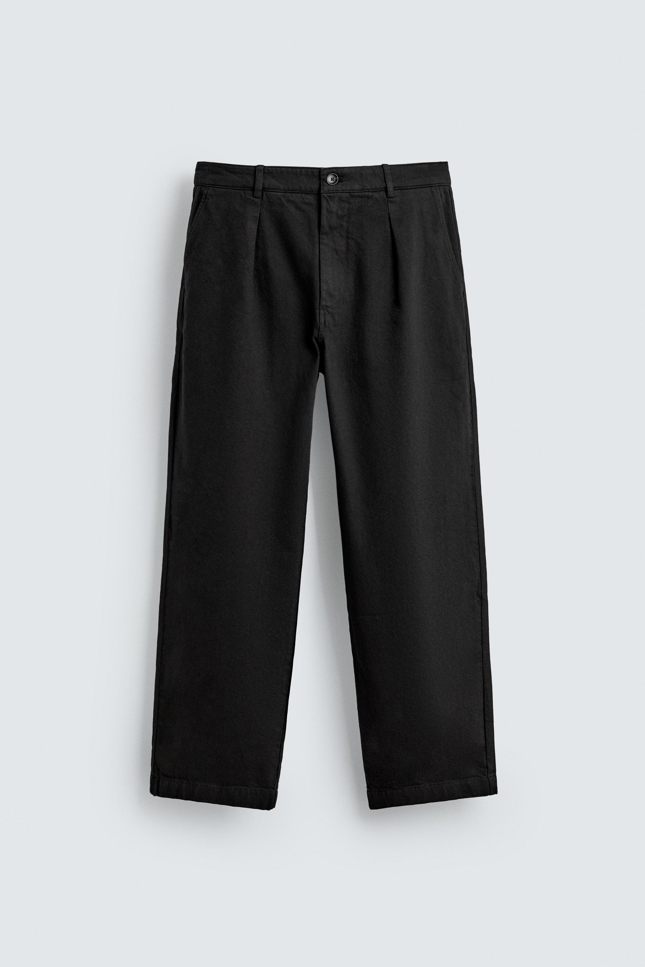 PLEATED RELAXED FIT PANTS